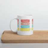 KEEP THE HAPPY HAPPENING Mug